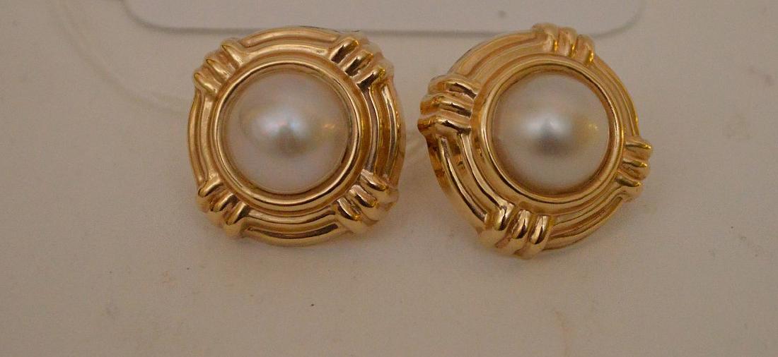 14kt yellow gold earrings with pearl centers: 14kt yellow gold earrings with pearl centers