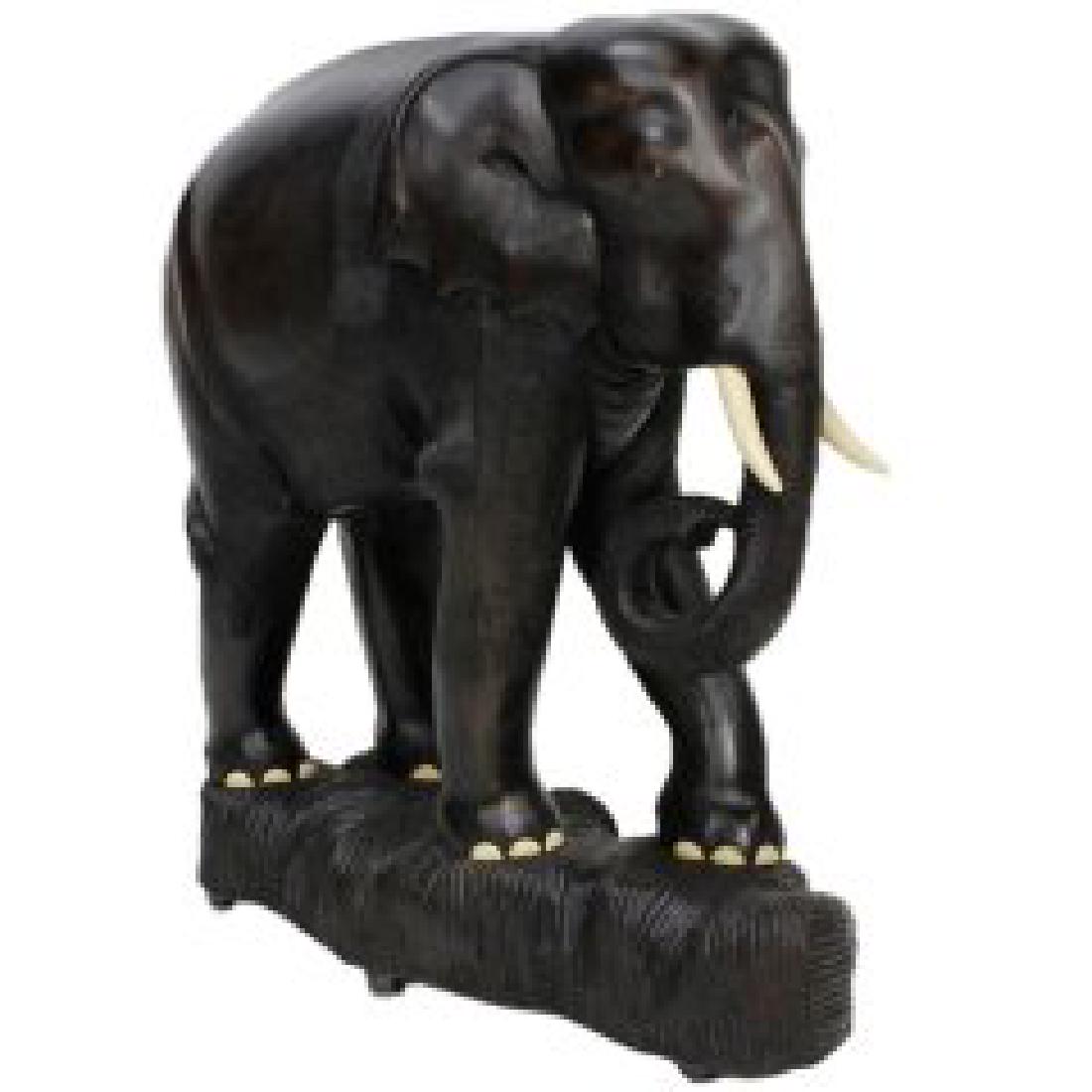 Large Carved Mahogany Elephant on custom castors; H. (1 of 6)