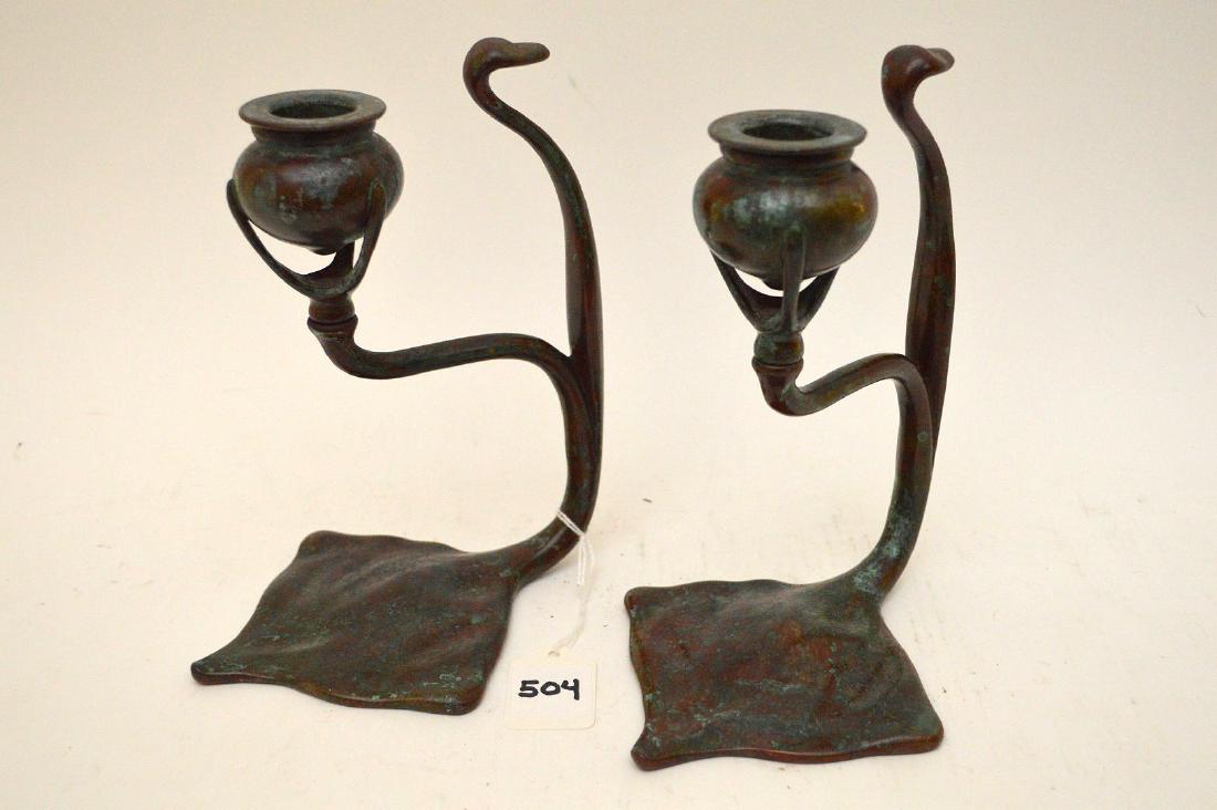 Pair Tiffany Studios Sting Ray Form Candlesticks. Each: Pair Tiffany Studios Sting Ray Form Candlesticks. Each marked Tiffany Studios New York 1208 on the bottom. Condition: good with no noticeable damage. Ht. 7 3/4"