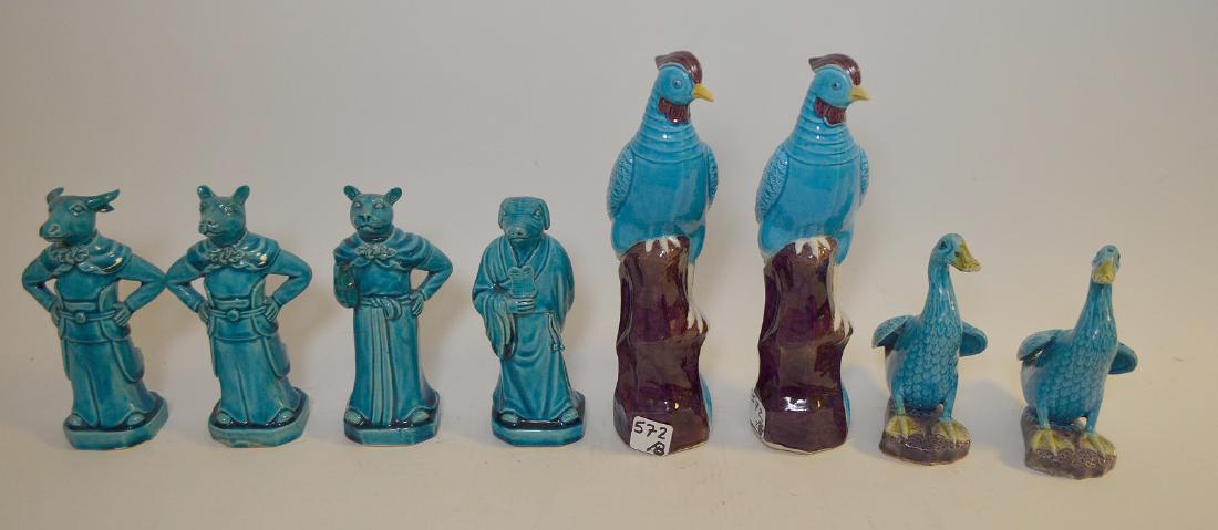 EIGHT TURQUOISE GLAZED PORCELAIN ANIMAL FIGURES -: EIGHT TURQUOISE GLAZED PORCELAIN ANIMAL FIGURES - Includes a pair of pheasant figures 10 1/4" H; a pair of ducks 6" H; and four anthropomorphic characters (cat, dog, pig, bull), approx. , 6 3/4" H. Co