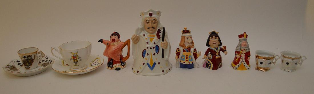 9 PCS ASSORTED CARD & GAMBLING ARTICLES. 1 English toby: 9 PCS ASSORTED CARD & GAMBLING ARTICLES. 1 English toby jug 7", pair of card salt & pepper 4", 2 Dept 56 Figures 4.5". 1 English porcelain cup and saucer. 1 English porcelain demitasse cup and saucer.