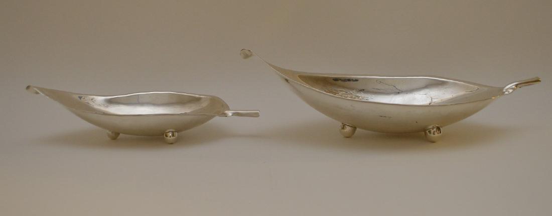 2 Bailey, Banks & Biddle sterling "leaf" bowls with: 2 Bailey, Banks & Biddle sterling "leaf" bowls with ball feet, modernist 1950's, 13.2 ozt, 8 1/4"L & 11"L