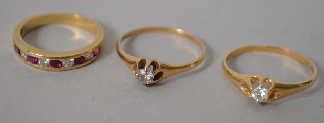 Three 14k yellow gold rings. Weight 6 grams, 2 Diamond: Three 14k yellow gold rings. Weight 6 grams, 2 Diamond rings and 1 diamond and ruby ring. Size 6.5-7. condition good normal wear