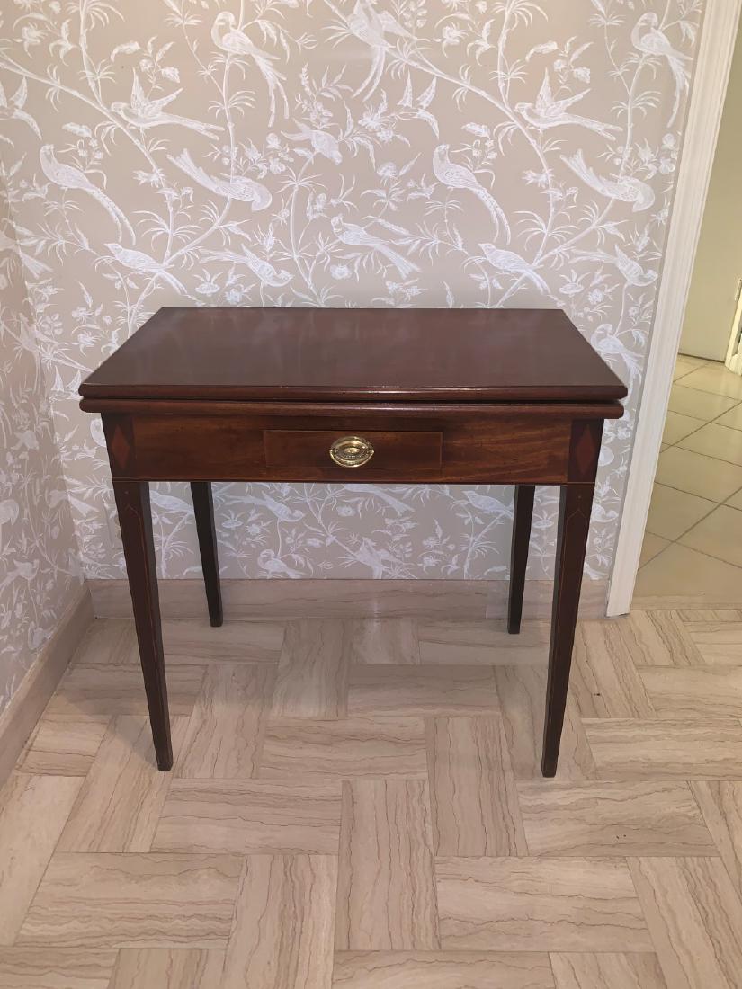 Mahogany folding top game table, 19th c. with single (1 of 3)