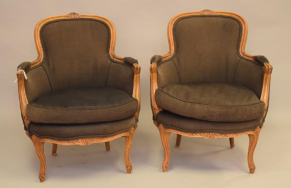 Pair country French bergeres, worn brown upholstery: Pair country French bergeres, worn brown upholstery