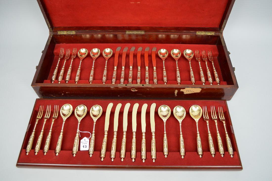 36 PIECES ENGLISH STERLING FLATWARE with gold vermeil: 36 PIECES ENGLISH STERLING FLATWARE with gold vermeil wash in fitted box. Condition: good for it's age. Knives Lth. 8 1/4", Forks 7 1/4" Spoons Lth. 7 1/4" 216 oz. Troy This item is available for in h