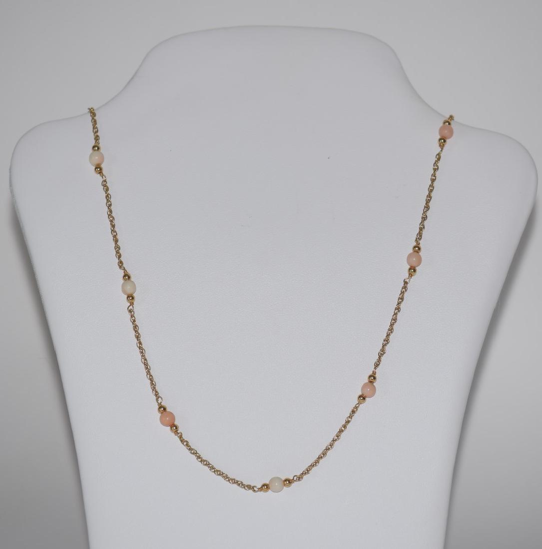 14k Yellow Gold & Coral beaded Necklace, Weight 5.9: 14k Yellow Gold & Coral beaded Necklace, Weight 5.9 dwts, Size 28" L, Condition good normal wear This item is available for in house shipping contact Maria 561-351-2013 or email gidgett63@gmail.com