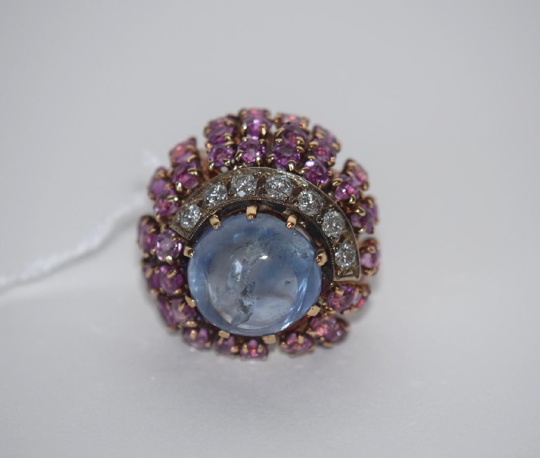 Vintage Seaman Schepps ring (tests 14kt gold), Ladies: Vintage Seaman Schepps ring (tests 14kt gold), Ladies cocktail ring, approx. 12 ct. Cabochon blue Sapphire, approx. 1.75 ct diamonds and approx. 8 cts pink sapphires, 17.0 dwt, ring size 6.5 This item