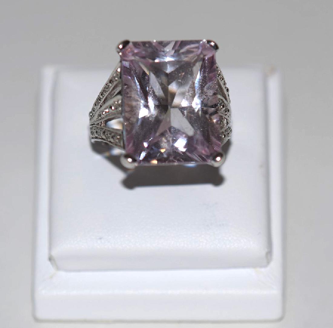 14kt white gold ring, rectangular light pink stone: 14kt white gold ring, rectangular light pink stone (possibly not a natural stone), approx. 30ct. This item is available for in house shipping contact Maria 561-351-2013 or email gidgett63@gmail.com