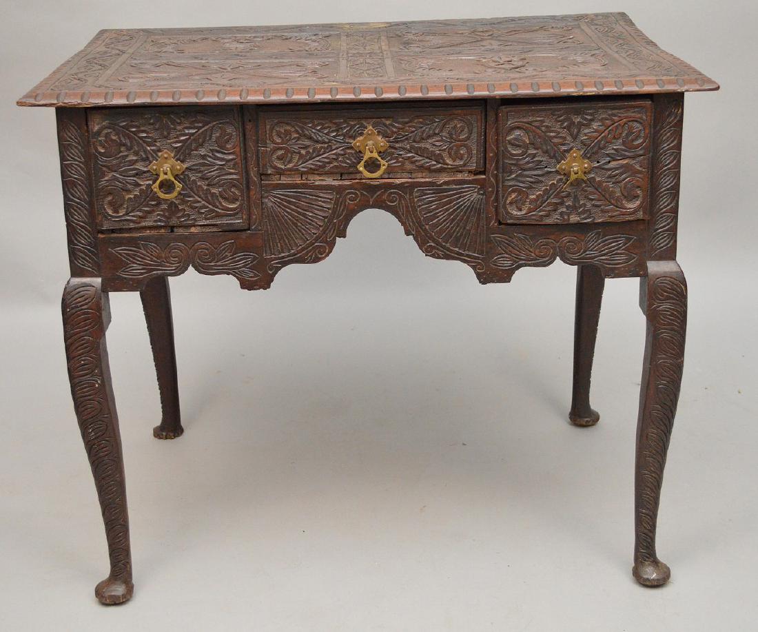Spanish Revival 19th c. carved 3 drawer stand, 29"h x: Spanish Revival 19th c. carved 3 drawer stand, 29"h x 33"w x 23"d