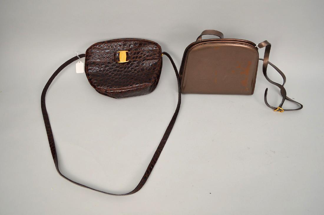 2 Brown Salvatore Ferragamo Handbags. 7" x 9" with: 2 Brown Salvatore Ferragamo Handbags. 7" x 9" with strap19-22 " made in Italy with serial number one shows wear see pics. This item is available for in house shipping contact Maria 561-351-2013 or ema