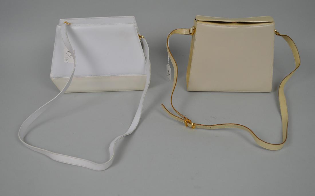 2 Salvatore Ferragamo handbags Cream & White. Condition: 2 Salvatore Ferragamo handbags Cream & White. Condition normal wear. Size 7.5" x 8.5" strap 18'-20". This item is available for in house shipping contact Maria 561-351-2013 or email gidgett63@gmail.co