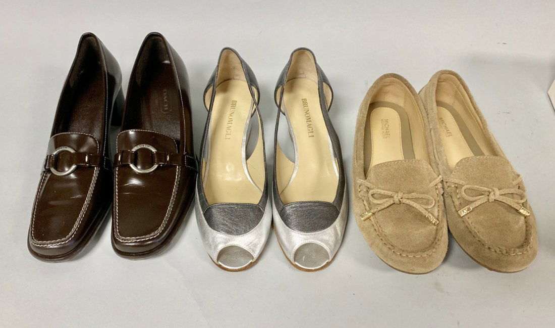 3 Pair Of Shoes Michael Kors, Coach & Bruno Magli.: 3 Pair Of Shoes Michael Kors, Coach & Bruno Magli. Michael Kors Suede Flats Size 7 unused, Coach Brown Pumps Size 7.5 unused, Bruno Magli Size 7.5 Silver normal wear on soles. This item is available f