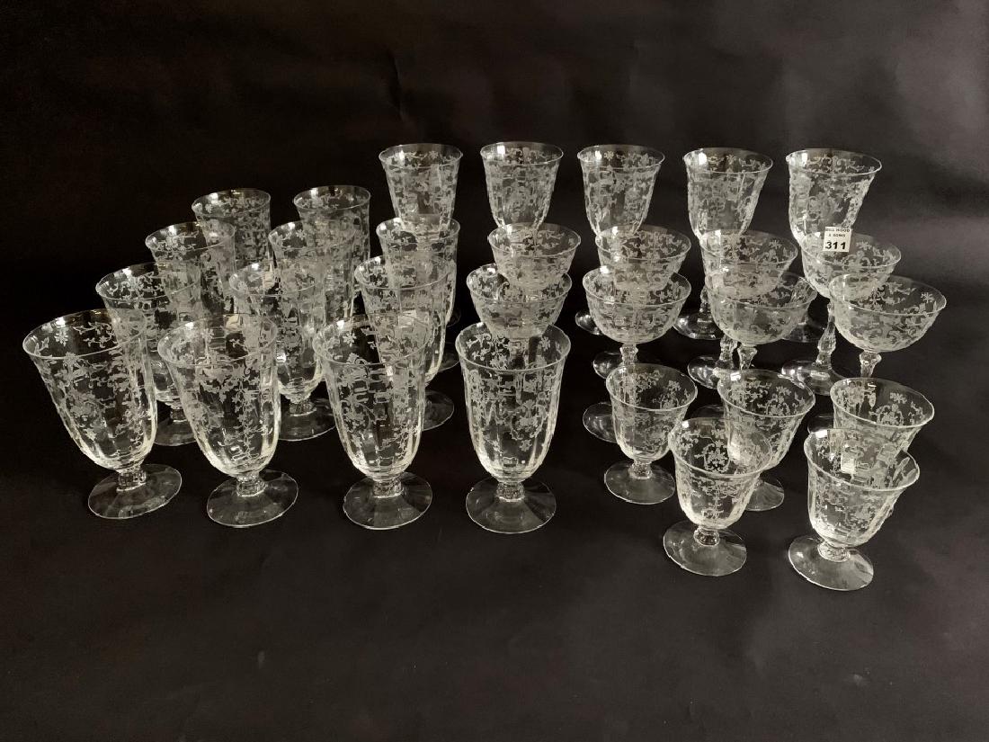 30 Pieces Assorted American 1940's Etched Stemware. 5: 30 Pieces Assorted American 1940's Etched Stemware. 5 Stems Ht. 3 3/4", 12 Water Glasses Ht. 6", 8 Stems 5 3/4", 5 Wine Stems 7 3/4"