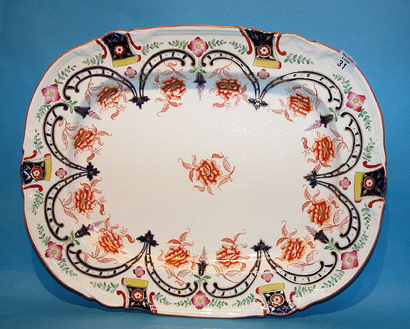 Porcelain Turkey Platter: Porcelain Turkey Platter elaborately decorated with orange flowers, blue and gold scrolling, green leaf and blue, yellow and gold border decorations, 18 1/2"l x 14 1/2"w x 2"h. excellent condition. Sh
