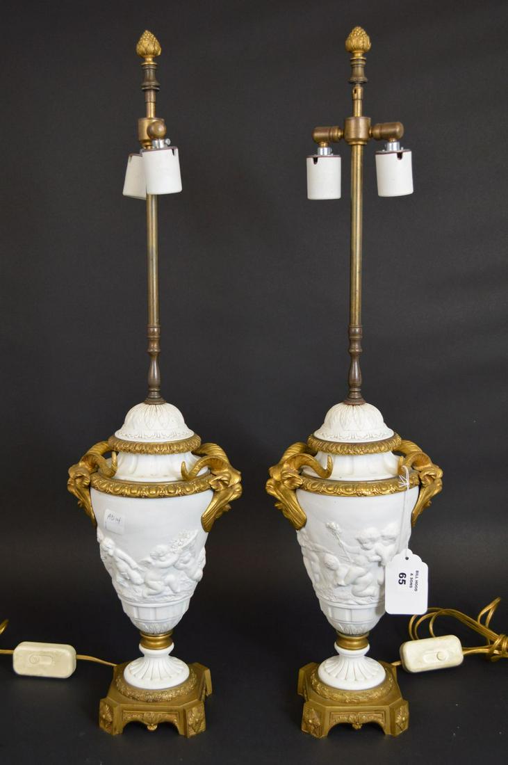 Pair ormolu mounted Parian porcelain table lamps,: Pair 19th Century ormolu mounted Parian porcelain table lamps, Sevres Style, vase shape with a putti frieze, ormolu masks side handles, 28"h