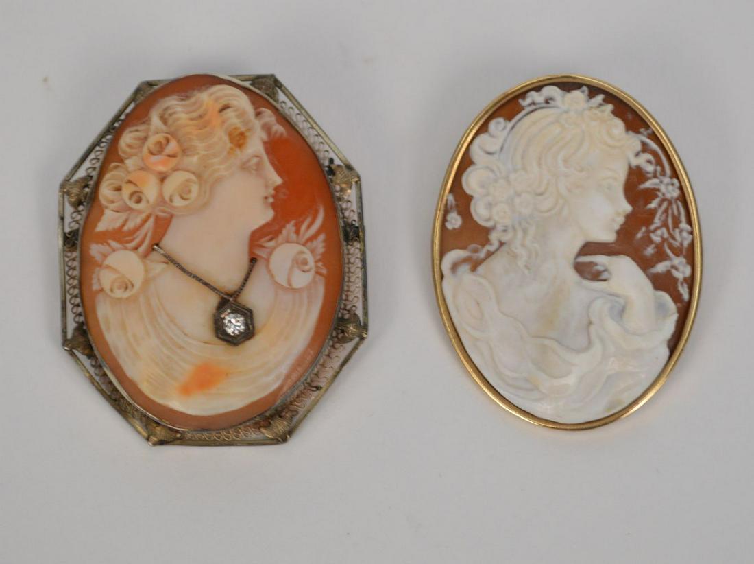 TWO 19TH CENTURY CAMEOS WITH 10k GOLD SETTINGS. Larger: TWO 19TH CENTURY CAMEOS WITH 10k GOLD SETTINGS. Larger height 2 1/8” smaller 1 3/4” total weight 19.6