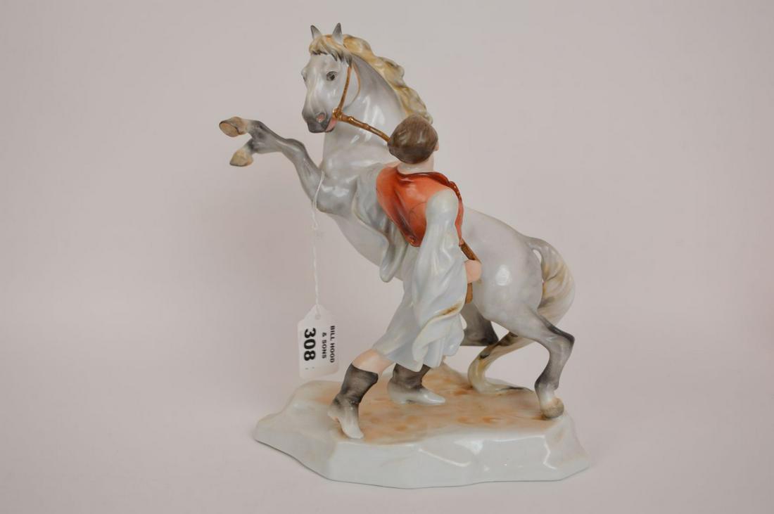 Herend porcelain grouping, rearing horse with trainer, (1 of 9)