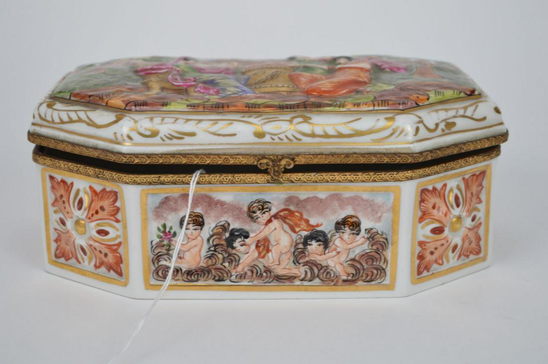 CAPODIMONTE PORCELAIN OCTAGONAL BOX, 3 1/4"H x 8 1/2"W: CAPODIMONTE PORCELAIN OCTAGONAL BOX, 3 1/4"H x 8 1/2"W x 6"D Condition: no issues identified.