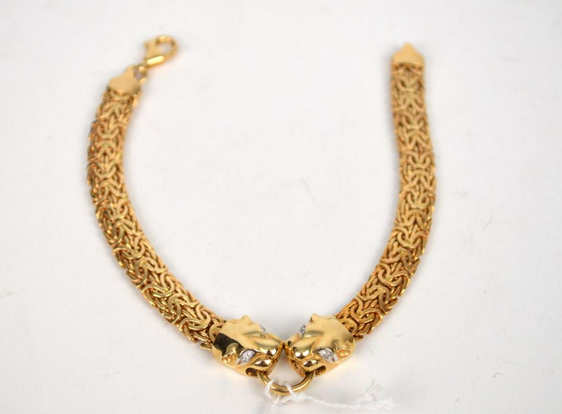 14k Yellow Gold Panther Bracelet with Diamond Eyes.: 14k Yellow Gold Panther Bracelet with Diamond Eyes. Weight 11.8 g Sze 7" width .25". Condition good normal wear