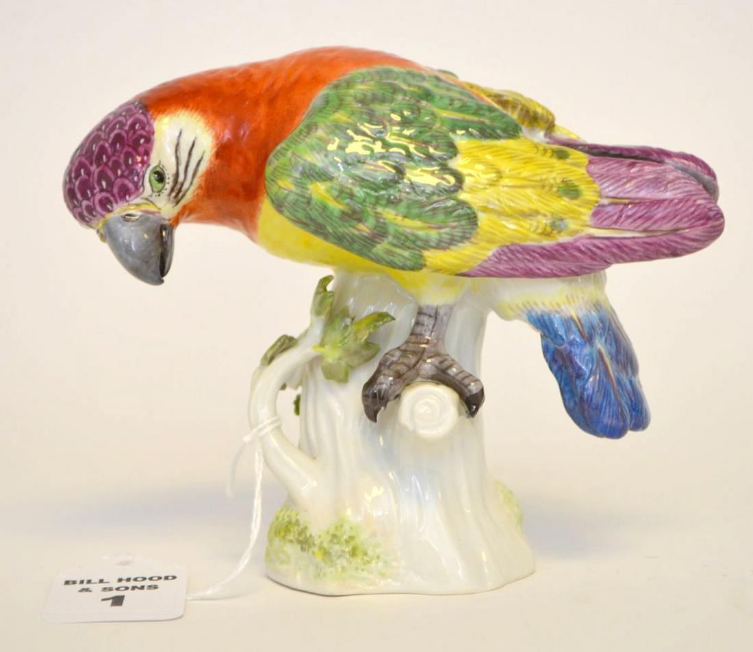 MEISSEN PORCELAIN PARROT, Late 19th Century with: MEISSEN PORCELAIN PARROT, Late 19th Century with crossed swords under glaze mark. With impressed registry number. Condition: no issues identified. Height 4 5/8" Width 5 inches Depth 3 1/2 inches