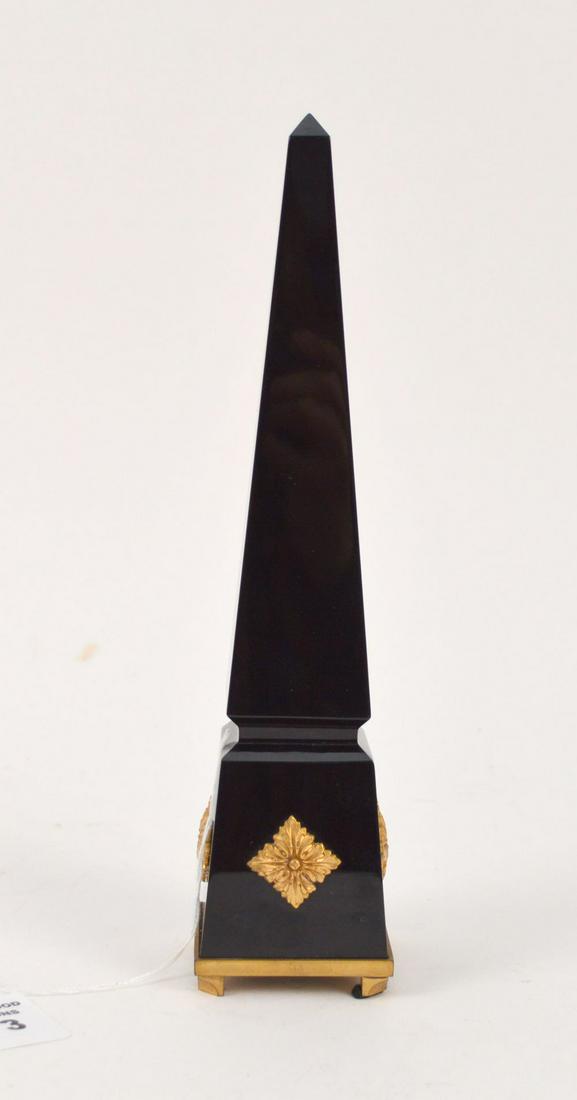 BACCARAT BLACK CRYSTAL & GILT BRONZE OBELISK.: BACCARAT BLACK CRYSTAL & GILT BRONZE OBELISK. Condition: no issues identified. Height 10 5/8" signed Baccarat on the bottom.