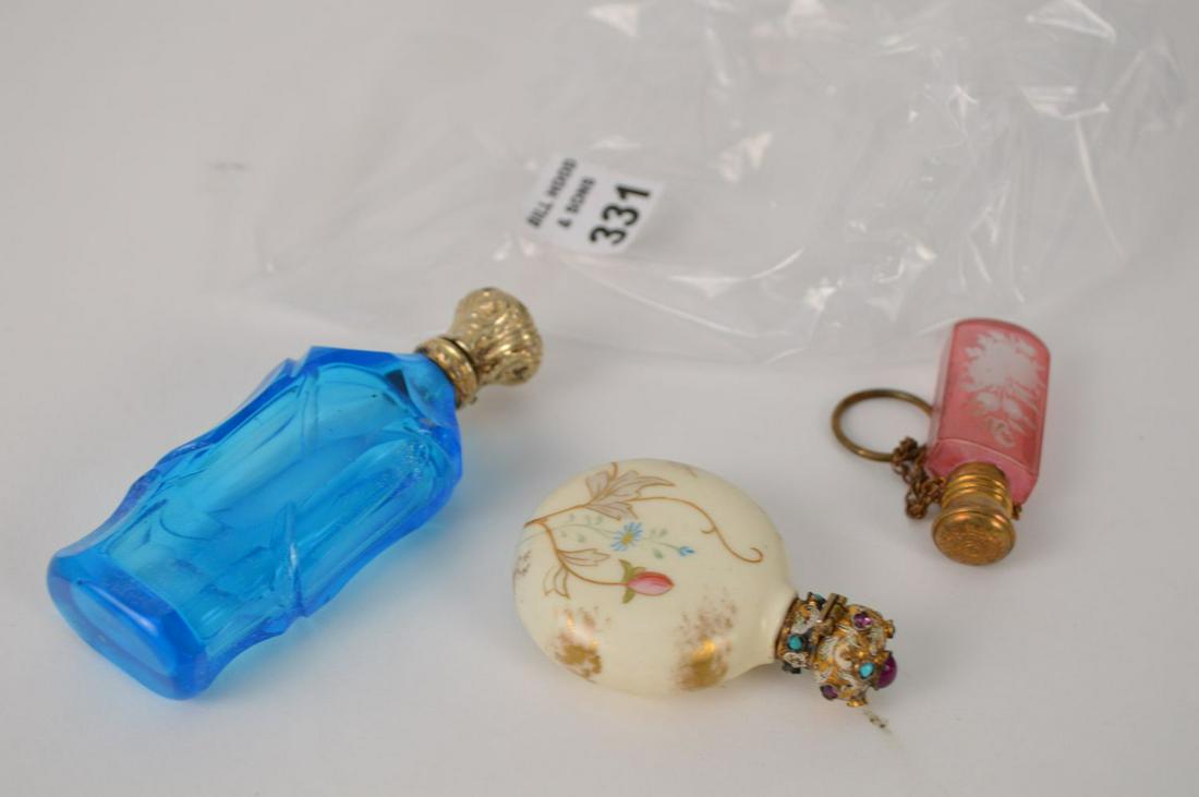 3 perfume bottles with silver tops, 2 glass, one etched: 3 perfume bottles with silver tops, 2 glass, one etched and one turquoise AND one round porcelain floral design, 4"h tallest