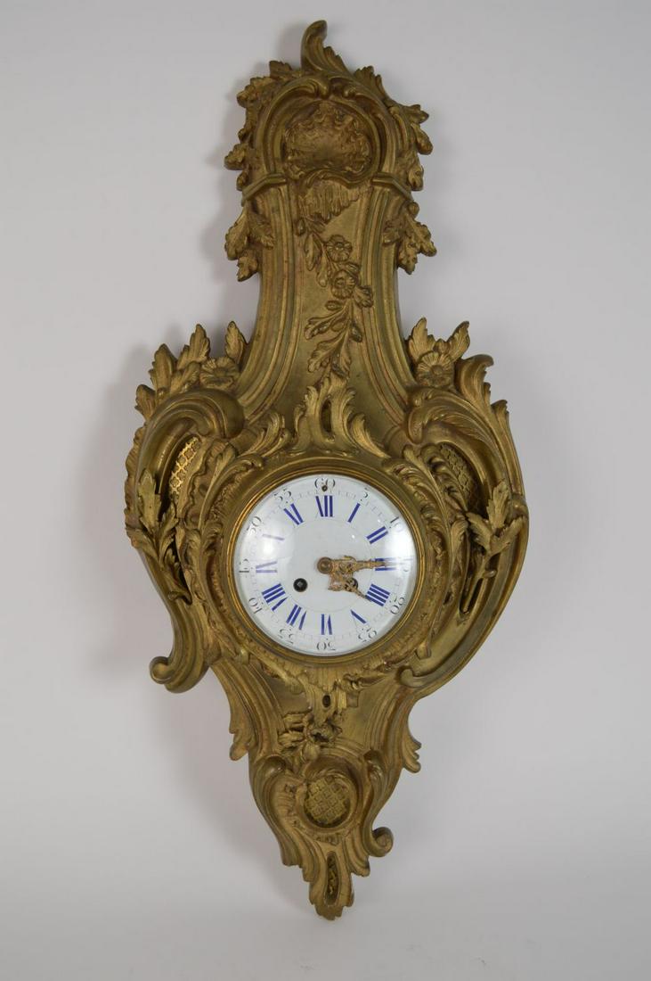 Antique Louis XV style Ormolu Gilt bronze Cartel Clock: Antique Louis XV style Ormolu Gilt bronze Cartel Clock with porcelain face, 35"h