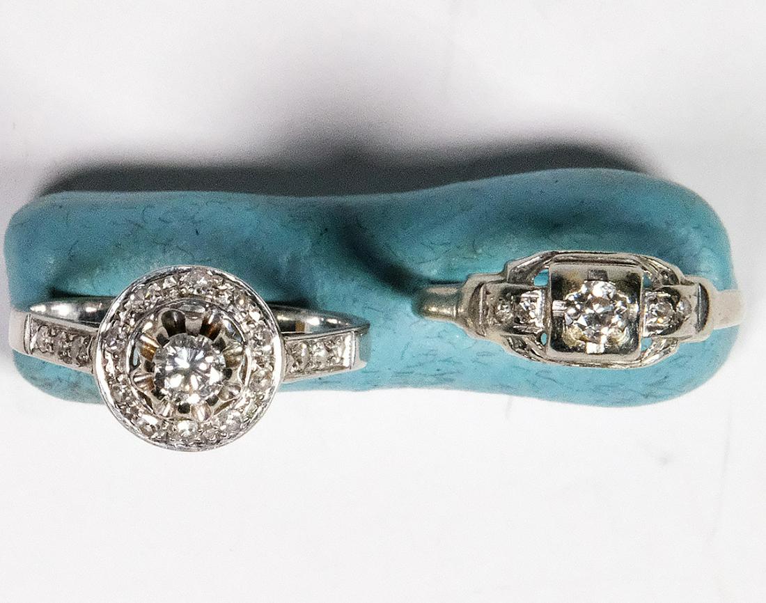 2- 18k White Gold Diamond Rings. Size 5.75 and 7 in: 2- 18k White Gold Diamond Rings. Size 5.75 and 7 in good condition normal wear. .33 Diamond with smaller diamond accent H-I SI1 & .25 mine cut diamond H-I SI1. total weight 4.7 grams