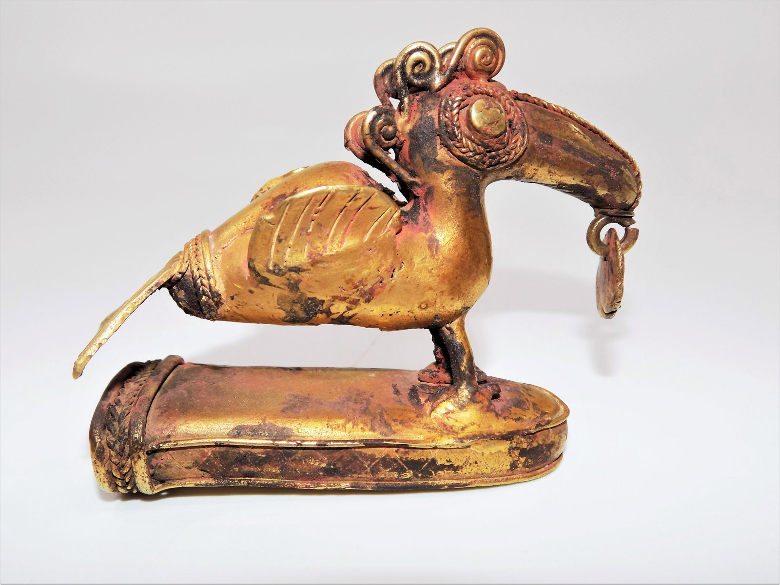 Pre-Columbian Gold Tumbaga Toucan , Heavy Signs of: Pre-Columbian Gold Tumbaga Toucan , Heavy Signs of Cinnabar, Decorative Braid and Scroll Work, Weighs 104 Grams, Dimensions: 3 1/2" x 2 3/4", Origin: Region of Costa Rica - Panama, Age: 800-1200 A.D.