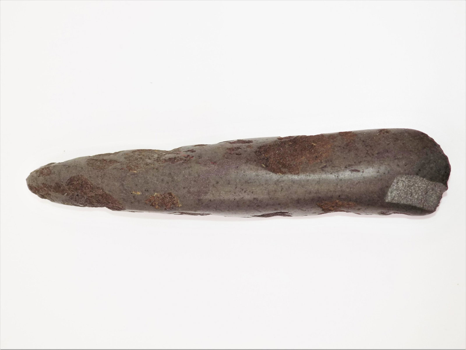 Pre-Columbian Stone Tool, Large Stone Axe, Very Sharp: Pre-Columbian Stone Tool, Large Stone Axe, Very Sharp Edger, Mineral Deposits and Signs of Erosion, Dimensions: 9 1/2" x 1 3/4", Origin: Nicoya Costa Rica Age:300-500 A.D.