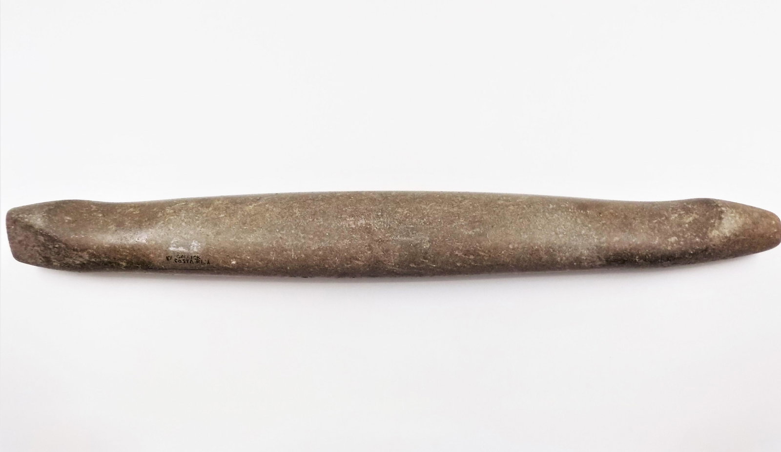 Pre-Columbian Stone Grinding Tool, From the Peter: Pre-Columbian Stone Grinding Tool, From the Peter Gallick Collection, Dimensions: 19 1/4" x 2 1/2", Origin: Costa Rica, Age: 500-800 A.D.