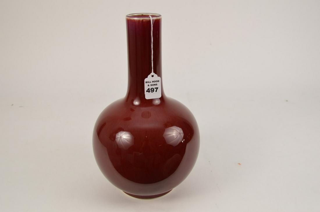 Chinese Porcelain "Globular" Flambe Vase, Qing Dynasty: Chinese Porcelain "Globular" Flambe Vase, Qing Dynasty Height 13 3/8" Diameter 7 7/8" Globular shape vase with long cylindrical neck over rounded shoulders, flambé glazed in copper red color. Conditi
