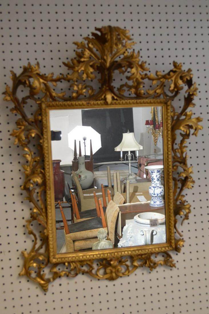 19TH CENTURY ITALIAN CARVED GILTWOOD MIRROR. The mirror (1 of 4)