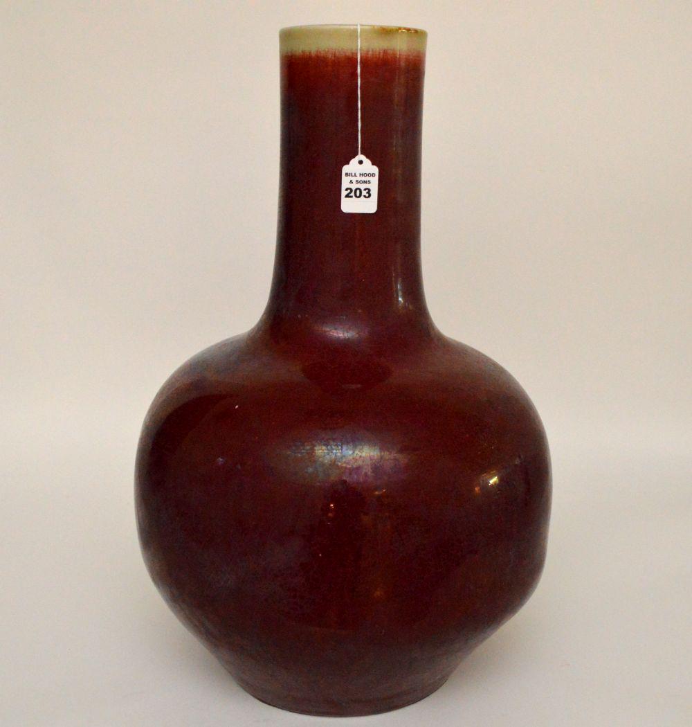 LARGE CHINESE QING DYNASTY GLAZED OX-BLOOD VASE.: LARGE CHINESE QING DYNASTY GLAZED OX-BLOOD VASE. Condition: cracks or chips. Height 22 1/8" ( 56.1 Centimeters ) Diameter 13 1/2" ( 34.29 Centimeters )