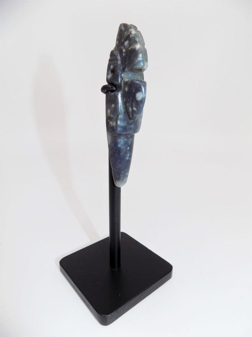 Pre-Columbian Creasted Avian Axe God Pendant, Finley: Pre-Columbian Creasted Avian Axe God Pendant, Finley Carved Crested Avian Pendant from Agate, Incised Lines, Holes Drilled for Suspension, Mineral Deposits, Custom Display Stand, Provenance: Woram Col