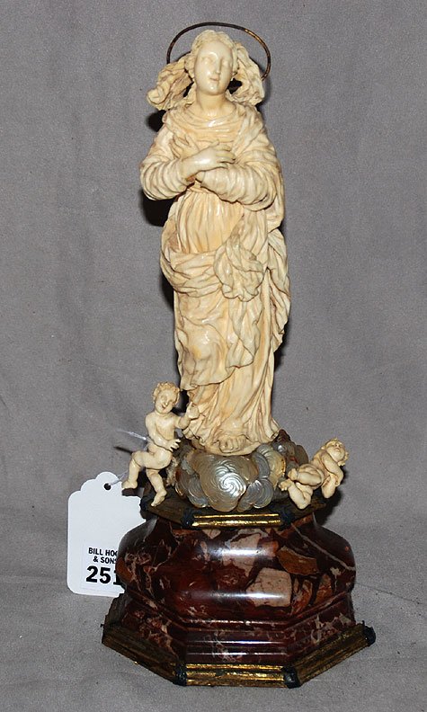 European ivory carved Madonna heavily carved