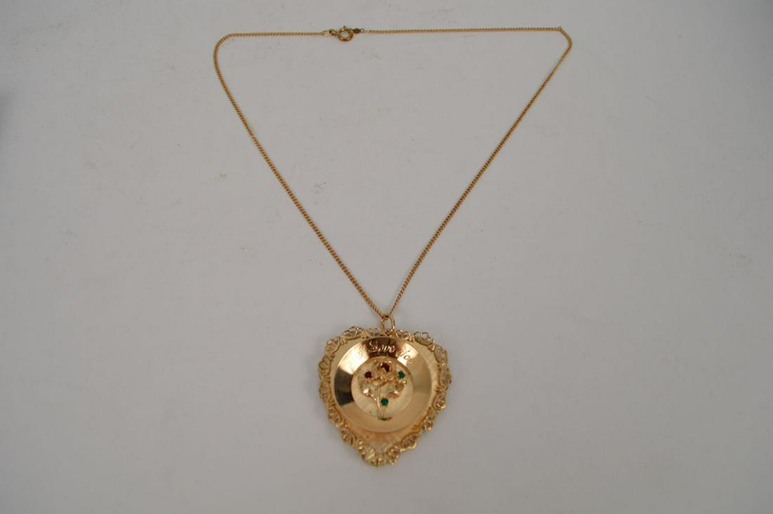 14k Gold Heart Pendant on 19" Chain. Heart Pendant 43: 14k Gold Heart Pendant on 19" Chain. Heart Pendant 43 mm x 40 mm wide 3 dimensional, inscribed on the inside I Love You. Weight 19.9 gramsShould you wish to pay by credit card you will need to send a 
