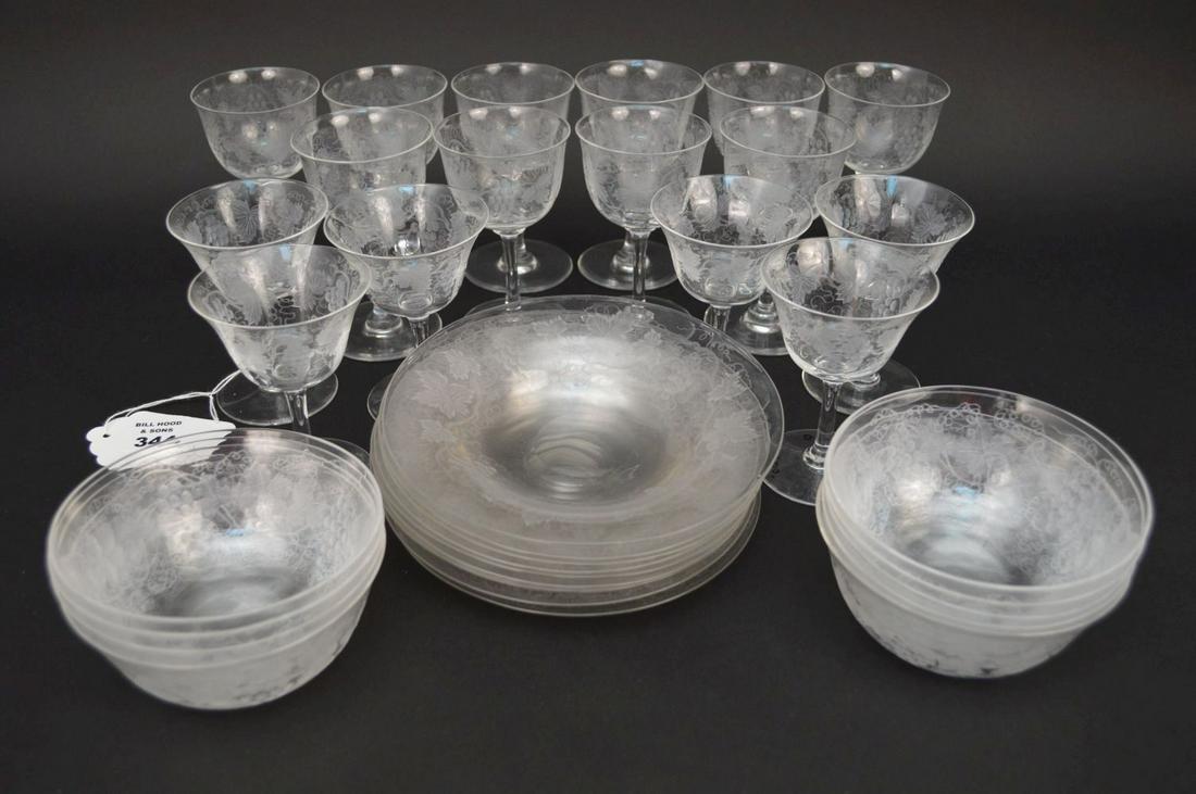 Partial etched crystal service, grape & vine motif, 9: Partial etched crystal service, grape & vine motif, 9 bowls, 9 plates, 10 wine glasses and 6 sherry glasses
