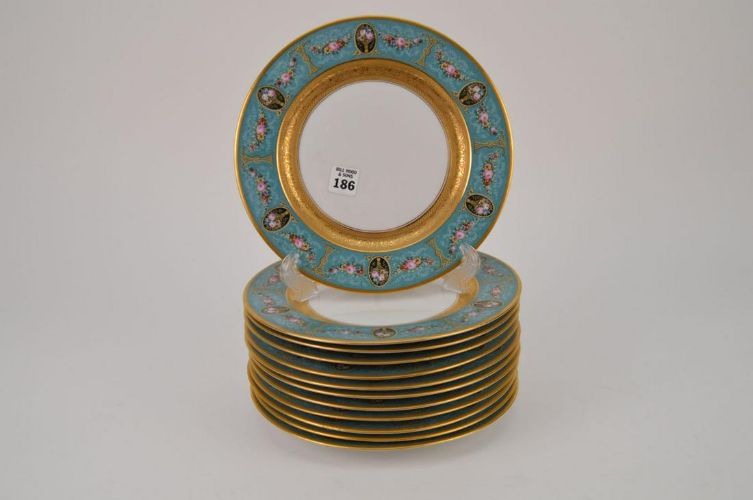 12 BLACK KNICHT PORCELAIN PLATES.  Condition: good with (1 of 5)