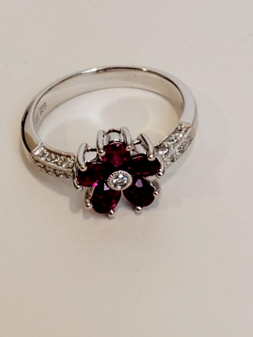 14k White gold Diamond with Red Stone Accents. Weight: 14k White gold Diamond with Red Stone Accents. Weight 2.3 dwt, Size 6.5 Condition good