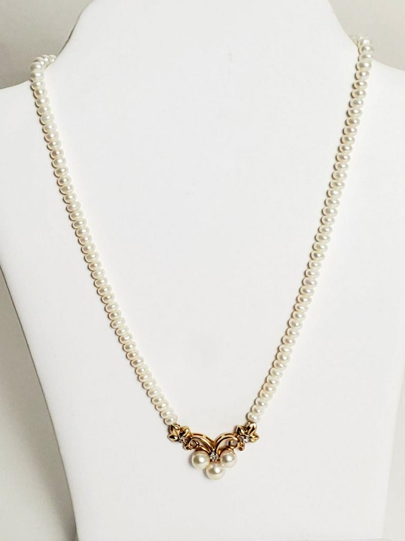 14K Yellow Gold Pearl Necklace. Size 16' Condition good: 14K Yellow Gold Pearl Necklace. Size 16' Condition good normal wear
