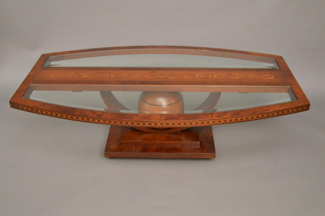 Unusual Mahogany & Glass Coffee Table on sphere and: Unusual Mahogany & Glass Coffee Table on sphere and stepped base, checkered inlay border with inlay wood panel in center, appears to bear signature - see pics. 15"h x 50"w x 29"d