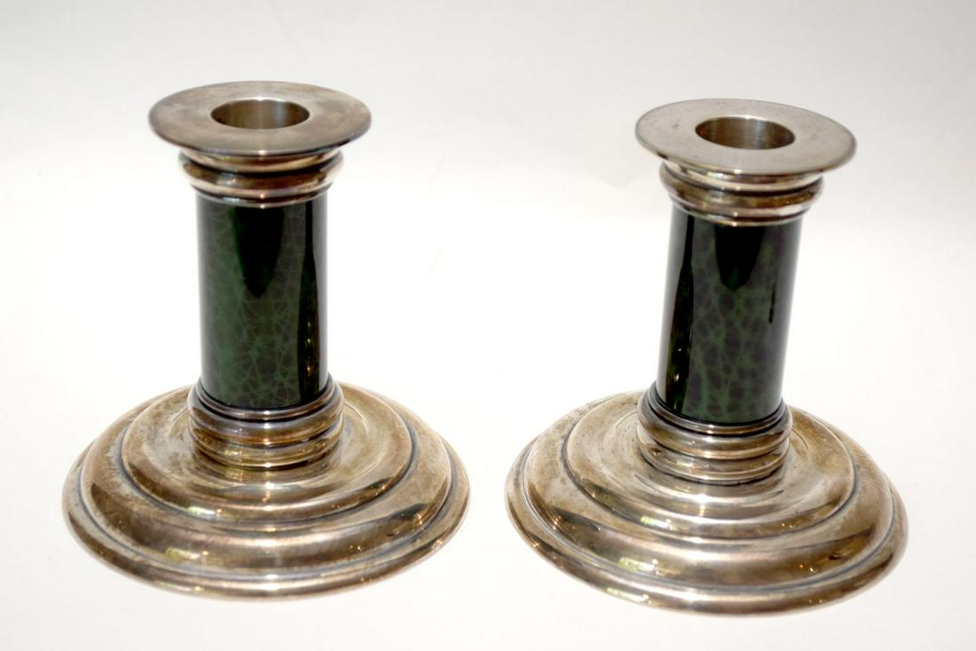 PAIR OF JEAN E. PUIFORCAT ART DECO CANDLESTICKS,J.E.: PAIR OF JEAN E. PUIFORCAT ART DECO CANDLESTICKS,J.E. Puiforcat (French, 1897-1945) Art Deco Silverplate 4 inches Diam: 4 inchesPuiforcat was a French silversmith, sculptor and designer. Miller's Antiq