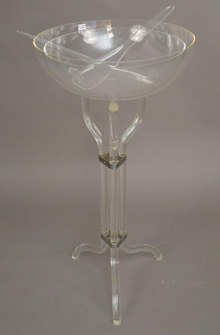 Lucite salad bowls accoutrements on a carved Lucite: Lucite salad bowls accoutrements on a carved Lucite Dorothy Thorpe base. Scratched, large bowl- 18 inches diameter x 34 inches tall