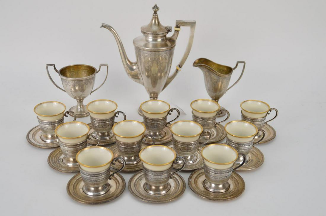 3 Piece Sterling Tea Set sold with 12 demitasse silver: 3 Piece Sterling Tea Set sold with 12 demitasse silver cups 11 saucers with 12 Lenox Liners. Silver weight is 44 toz.