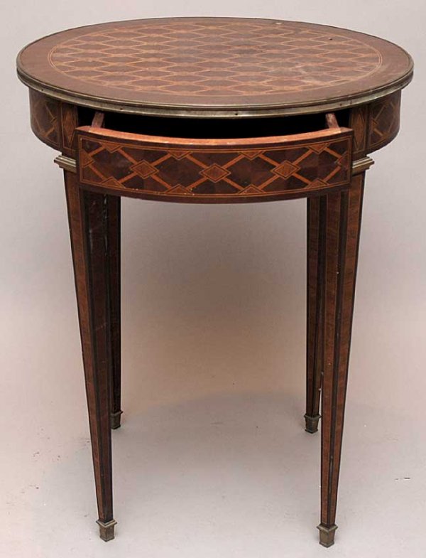 Round occasional table mahogany with inlaid diamo