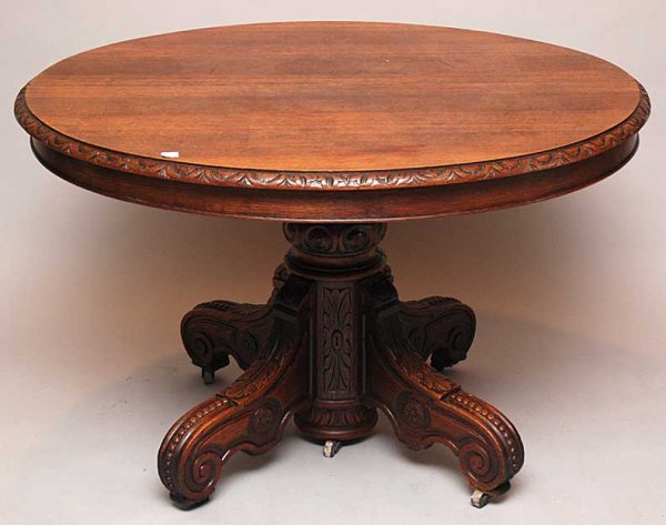Round oak table carved center pedestal and legs,