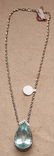 1144A: 48ct. Aquamarine pendent w/ 14kt. white chain, a