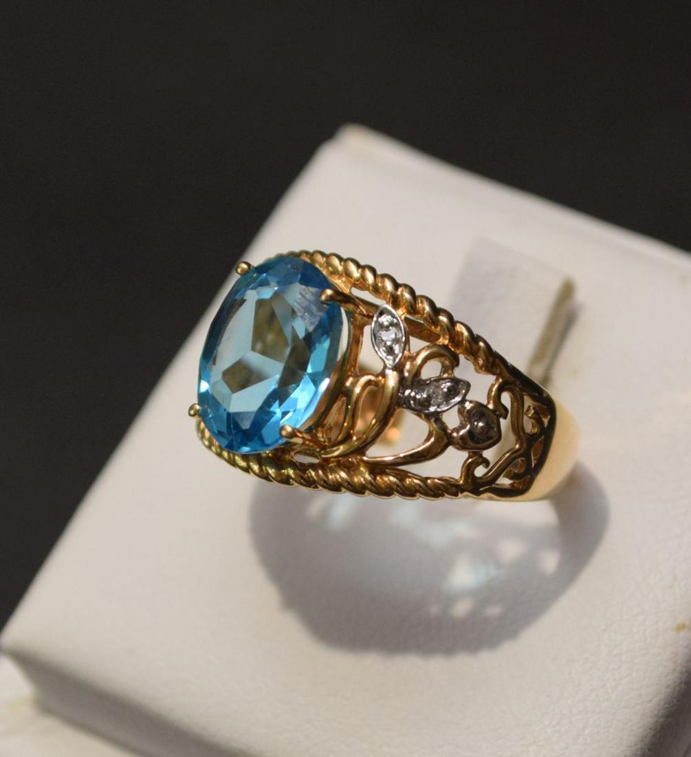 14k Yellow Gold Blue Topaz Ring. Size 5 1/2, weight: 14k Yellow Gold Blue Topaz Ring. Size 5 1/2, weight 4.0. Condition good normal wear